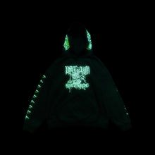 Random Bastards hoodie showing green glow in the dark graphics